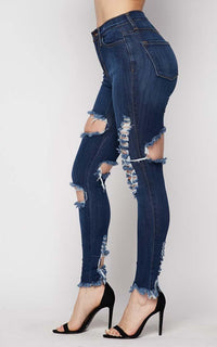 Vibrant Frayed and Distressed Jeans in Medium Wash - SohoGirl.com