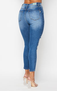 Vibrant Cropped Distressed Denim Skinny Jeans - SohoGirl.com
