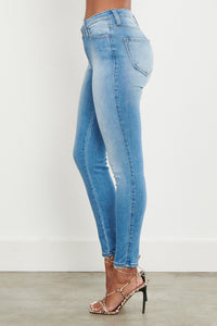 High Waist Skinny Jean With Crossed Waist - Light Denim - SohoGirl.com